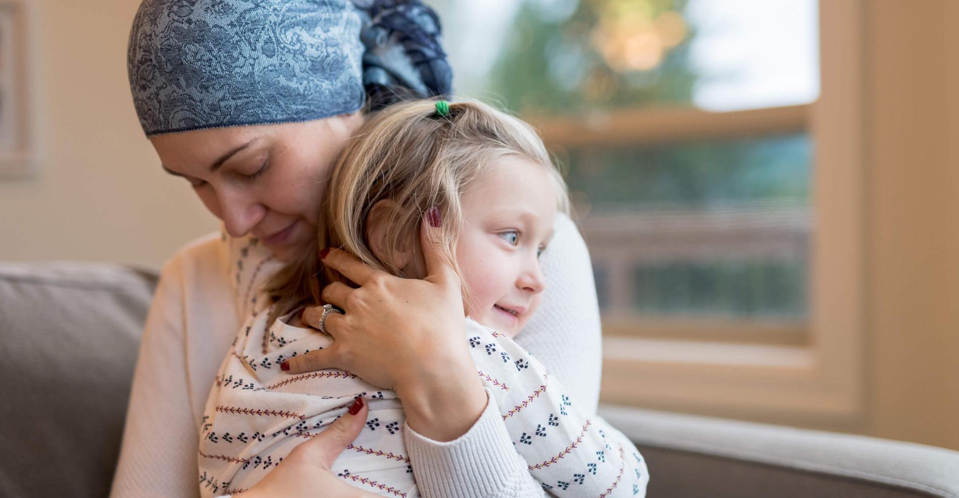 woman-hugging-child-daughter